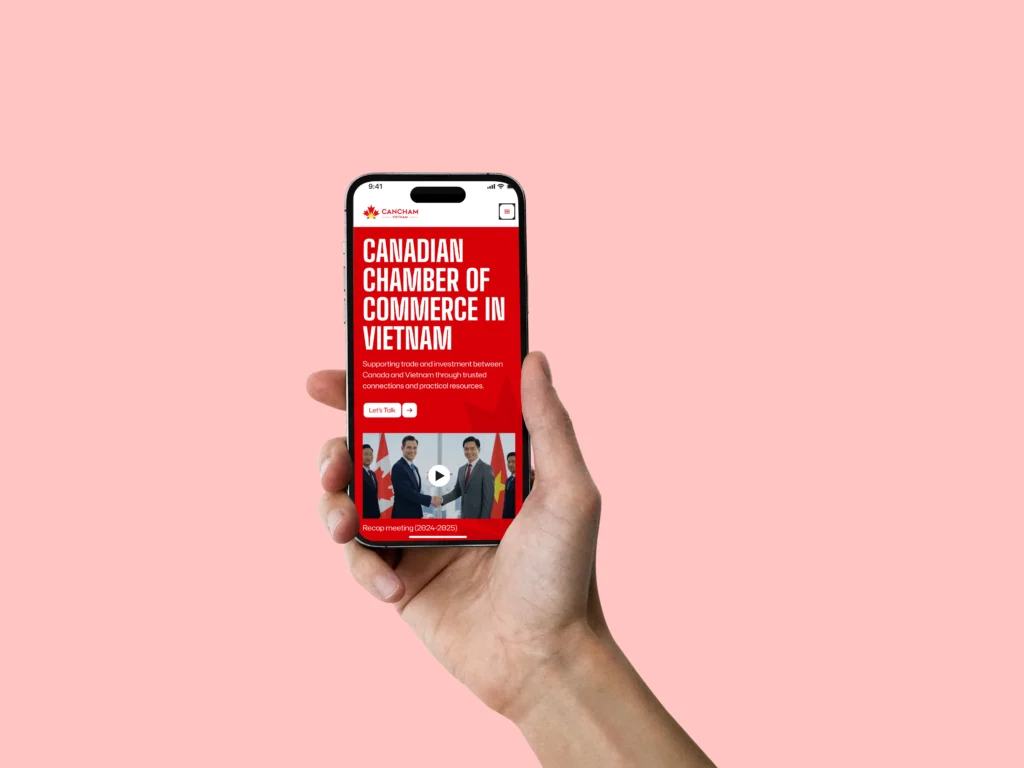 Smartphone displaying the mobile-responsive homepage for the Canadian Chamber of Commerce in Vietnam